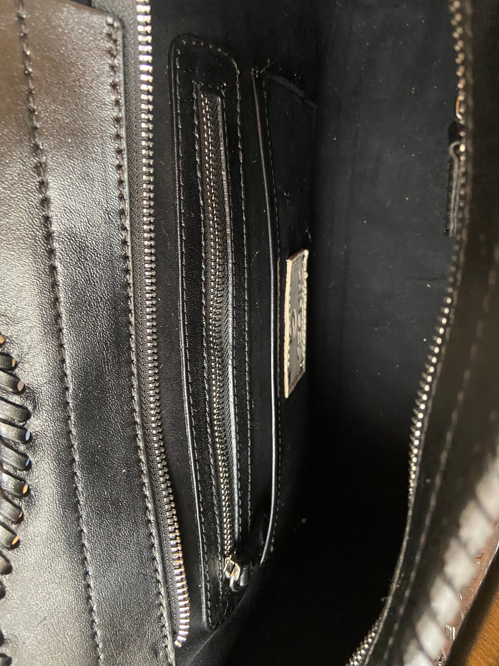 Cheyenne handmade tooled leather purse black inside