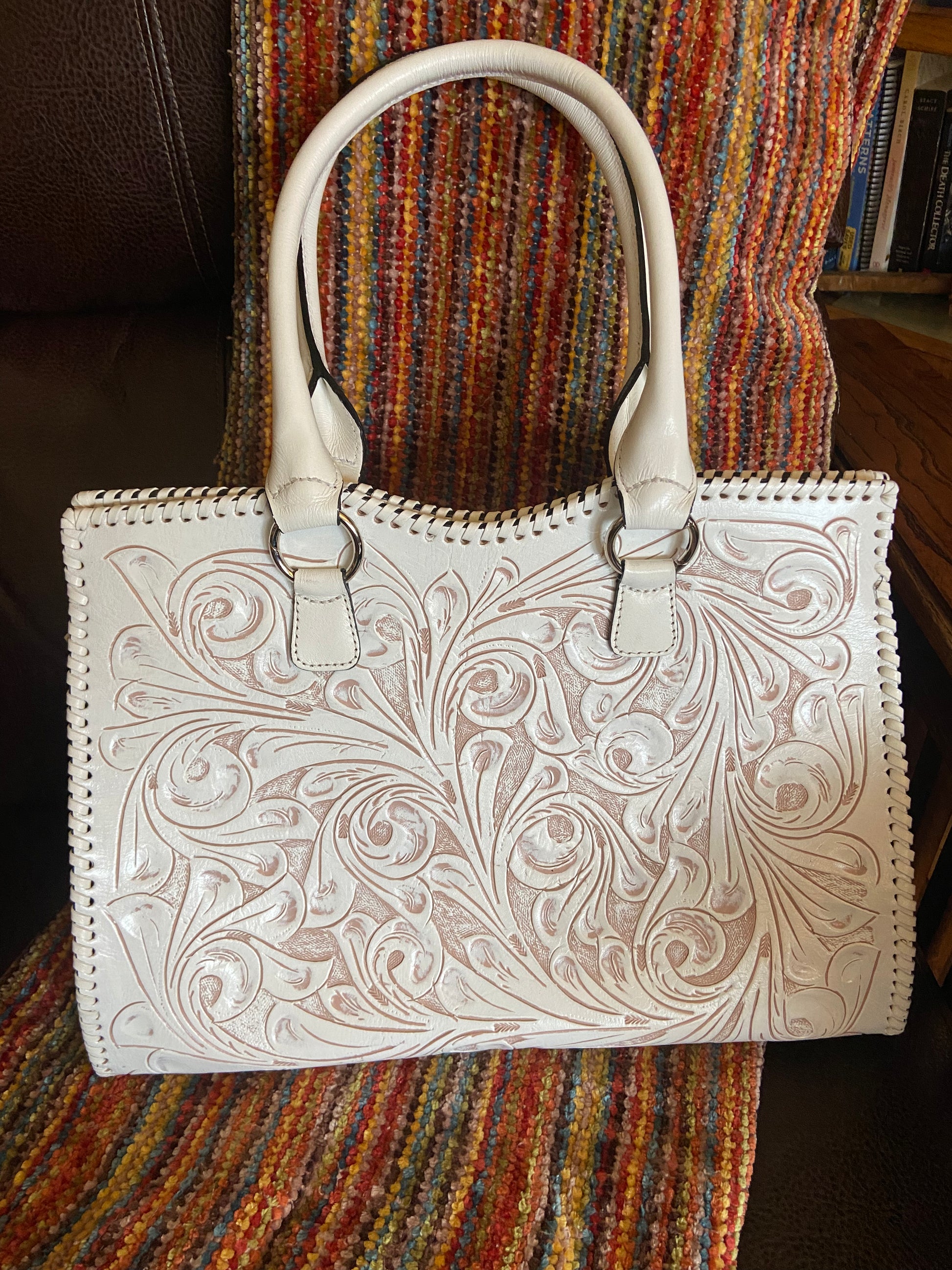 Cheyenne handmade tooled leather purse white front