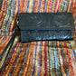 Merida handmade tooled leather clutch purse black front