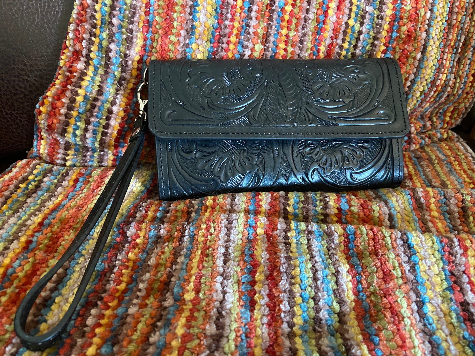 Merida handmade tooled leather clutch purse black front