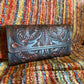 Merida handmade tooled leather clutch purse brown front