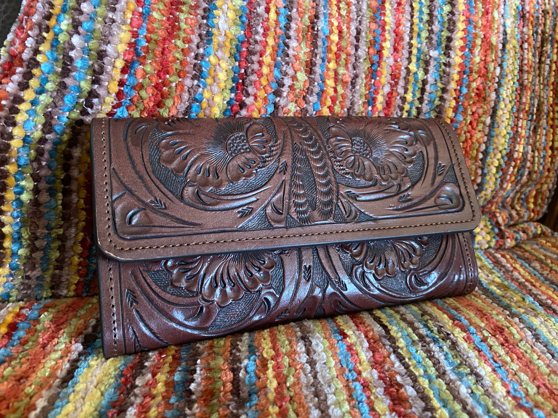 Merida handmade tooled leather clutch purse front