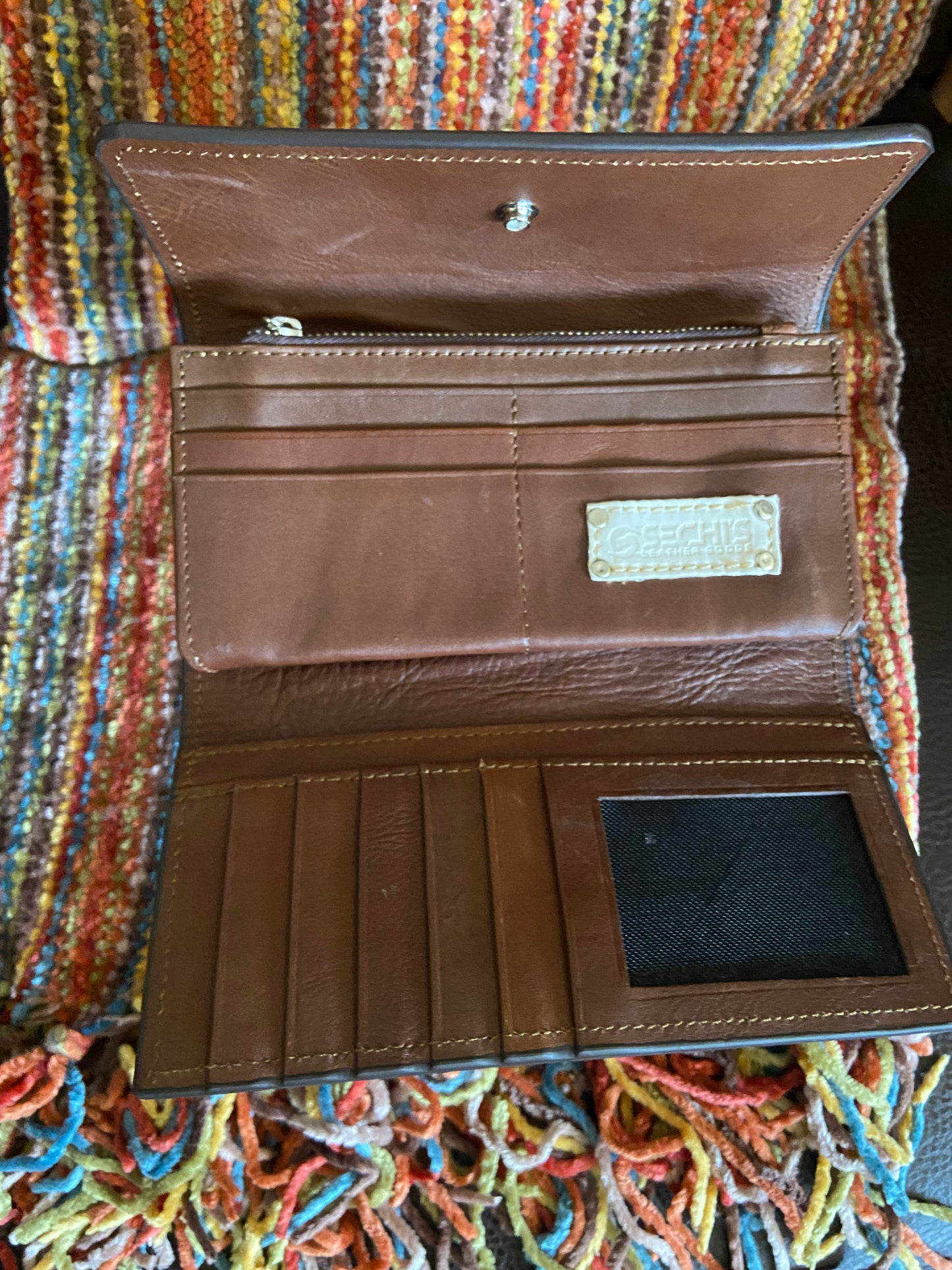 Merida handmade tooled leather clutch purse inside